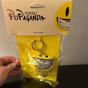 Ron English’s POPAGANDA Grin Smiley Face Keychain (NWT)